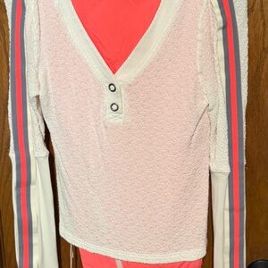 Free People Movement Recovery Layer shirt and Fly by Night pants in neon coral